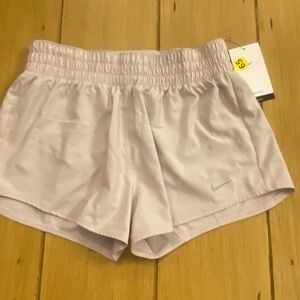 Nike women small running athletic shorts very light pink mauve dri fit NEW